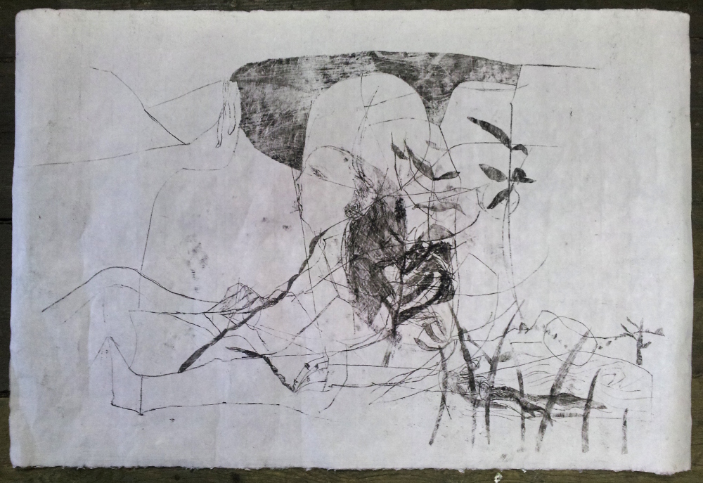 Man sat by a hill&nbsp;trail