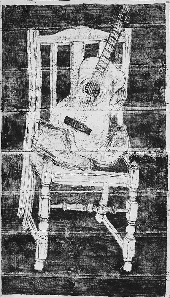 Guitar and boots on a chair&nbsp;2