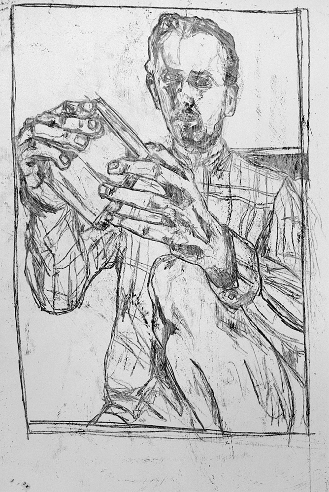 Self-portrait holding carving block